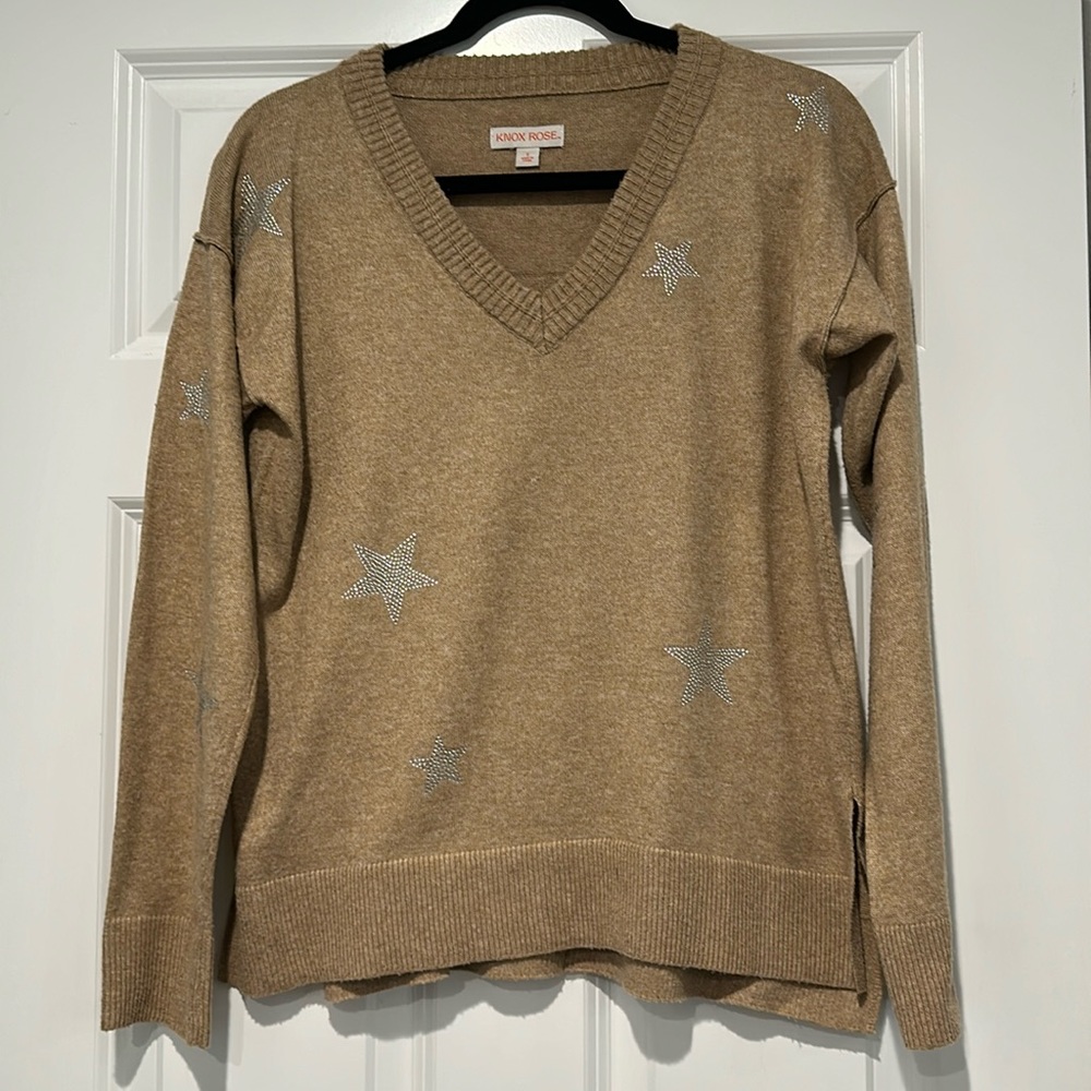 Soft light tan sweater with silver rhinestone stars